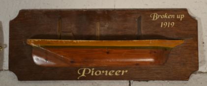 A collection of 3 wooden painted half hulls. To include Hope Town, Pioneer - Broken up 1919 and