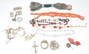 A mixed group of Victorian and later costume and other jewellery to include a coral necklace, belt