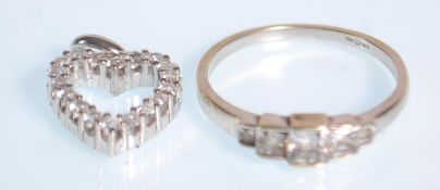 A 9ct white gold and diamond 5 stone pave set ring with cushion cut stones together with a 9ct white