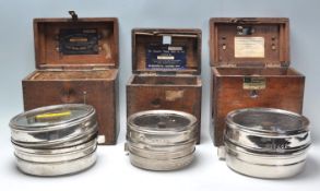 Two oak cased vintage 20th Century Pigeon clocks, both clocks housed in chrome cases within oak