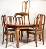 A late 19th century oak extending dining table rai