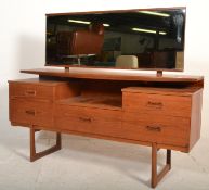 A vintage retro 20th Century teak wood dressing table chest having large rectangular mirror back