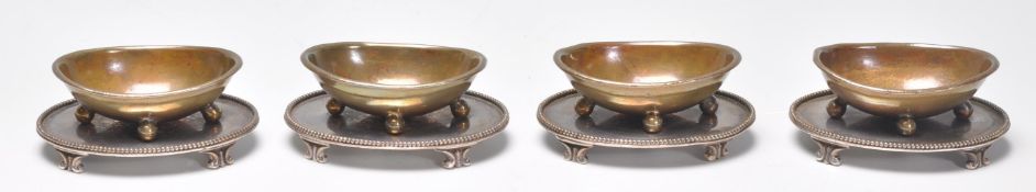 A set of 4 19th century Thomas Harwood & Sons silver plate EP and copper table salts. Each of