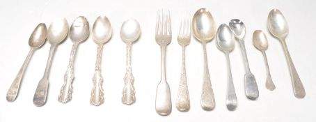 A mixed group of silver flatware dating from the 19th Century to include a matching Hanoverian spoon