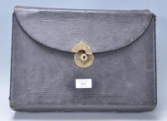 A 19th Century WIlliam Lund of London leather bound travelling writing slope having a hinged lid