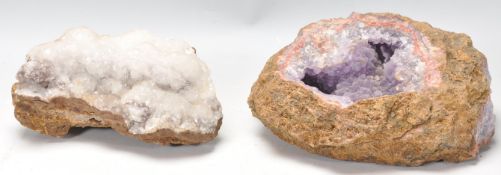 Two geological amethyst geode specimen rocks.