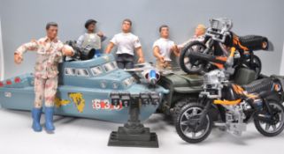 A large collection of vintage 1990's Hasbro made Action Man figures / dolls. Many with weapons and