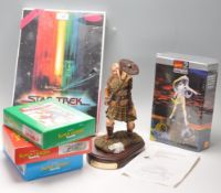 A group of three boxed Corgi Marvel Super Heroes diecast vehicles; Captain America, X men and