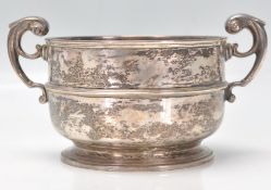 A late 19th Century Victorian silver hallmarked bowl having twin scroll handles. Hallmarked for
