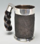 An unusual vintage 20th Century silver plate on copper tankard having elephant skin covered body and