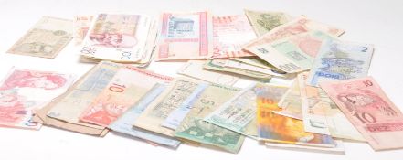 A small collection of world banknotes to include Middle East & European example.