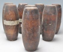 A set of 8 vintage 20th century wooden pub - village skittles - all well used by of good conical