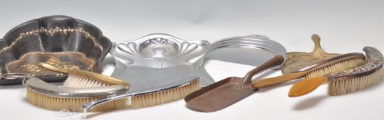 A good mixed collection of crumb trays and brushes dating from the 19th Century to include a