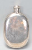 A good large vintage 20th Century silver hallmarked hip flask of simple form having a screw cover.