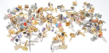 A large collection of vintage and later gentleman's cufflinks of varying designs and materials