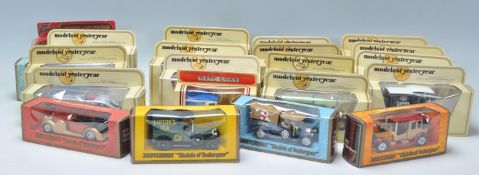 A collection of approx 25 boxed Matchbox Models Of Yesteryear to include a 1945 MG, 1912 Rolls