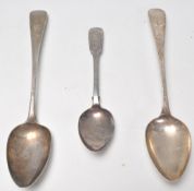 Two 19th Century Georgian silver hallmarked serving spoons. One having engraved scroll and floral