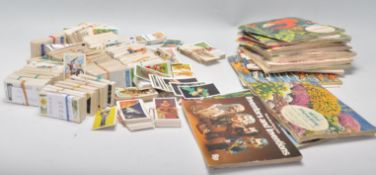 A mixed collection of full and part sets of tea and cigarette trade cards to include Wills Races