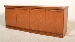 A retro mid 20th Century G Plan low teak wood sideboard credenza having a configuration of two