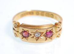 A 19th Century Victorian hallmarked 18ct gold ring gypsy set with a diamond and flanked by two