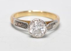 An 18ct gold and diamond single stone ring. The round cut diamond being approx ct weight 0.46cts
