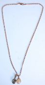 A 9ct gold figaro link necklace chain adorned with 2 opal necklace pendants. The champed 375. Length