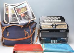 A vintage 20th Century Adria made accordion, model Diaton IV Grand Luxe finished in black with