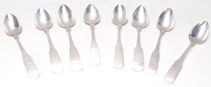 A set of 8 American A. Wilcox & B&M silver teaspoons in the fiddle pattern stamped to the back of
