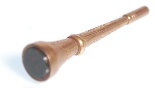 A 19th Victorian 9ct gold pocket fob / pocket watch winder having engraved floral and scroll