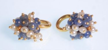 A pair of 750 / 18ct gold pearl and simulated sapphire charm clusters being set to 18ct gold hoop