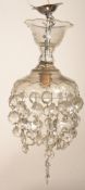 An early 20th Century Edwardian cut glass ceiling light shade with cut glass droplets.
