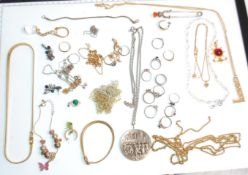 A collection of ten rings to include; five silver rings each being set with precious stones, and