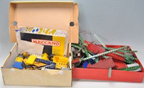 A mixed collection of vintage Meccano wares, some boxed examples with mostly loose.