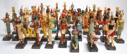 A collection of 50+ Egyptian funeral / Shabti figures including such Gods as Ra, Osiris, Bastet,
