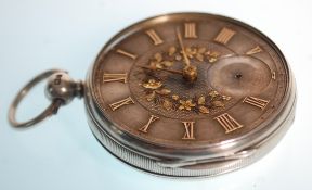 A good 19th Century Victorian silver hallmarked pocket watch having a silvered dial with gold inlaid