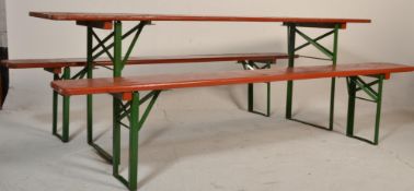 A vintage industrial / festival / garden Trestle table and two bench set with painted  pine tops