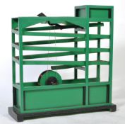 UNUSUAL 20TH CENTURY GREEN PAINTED MARBLE RUN