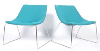 PAIR OF CONTEMPORARY RETRO SIDE CHAIRS RAISED ON CHROME LEGS