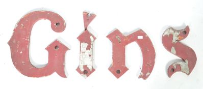 SET OF VINTAGE CAST METAL LETTERS READING GINS