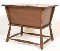 A late 19th century carved Arts & Crafts oak ladie