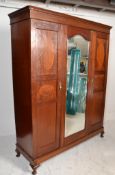 An Edwardian mahogany ebony line inlaid triple war