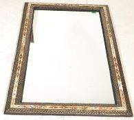 An unusual Moorish - Moroccan wall mirror having a