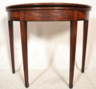 A 19th century Georgian solid mahogany demi lune /
