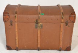 A vintage early 20th Century dome top canvas and c