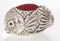 A Sterling silver pin cushion in the form of a fis
