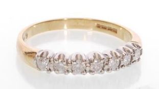 A hallmarked 9ct gold diamond 7 stone ring. Hallma