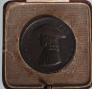 A commemorative Fry & Sons 1928 commemorative meda