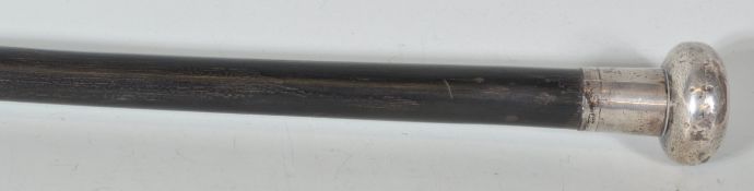 An early 20th Century walking stick cane having a