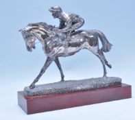 Horse Racing - A silver hallmarked over resin figu