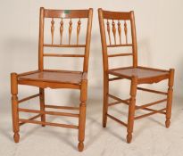 A good pair of early 20th Century oak spindle back